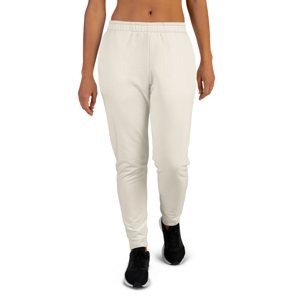 Arnwolf · Joggers reciclados para mujer con estampado completo — Marfil