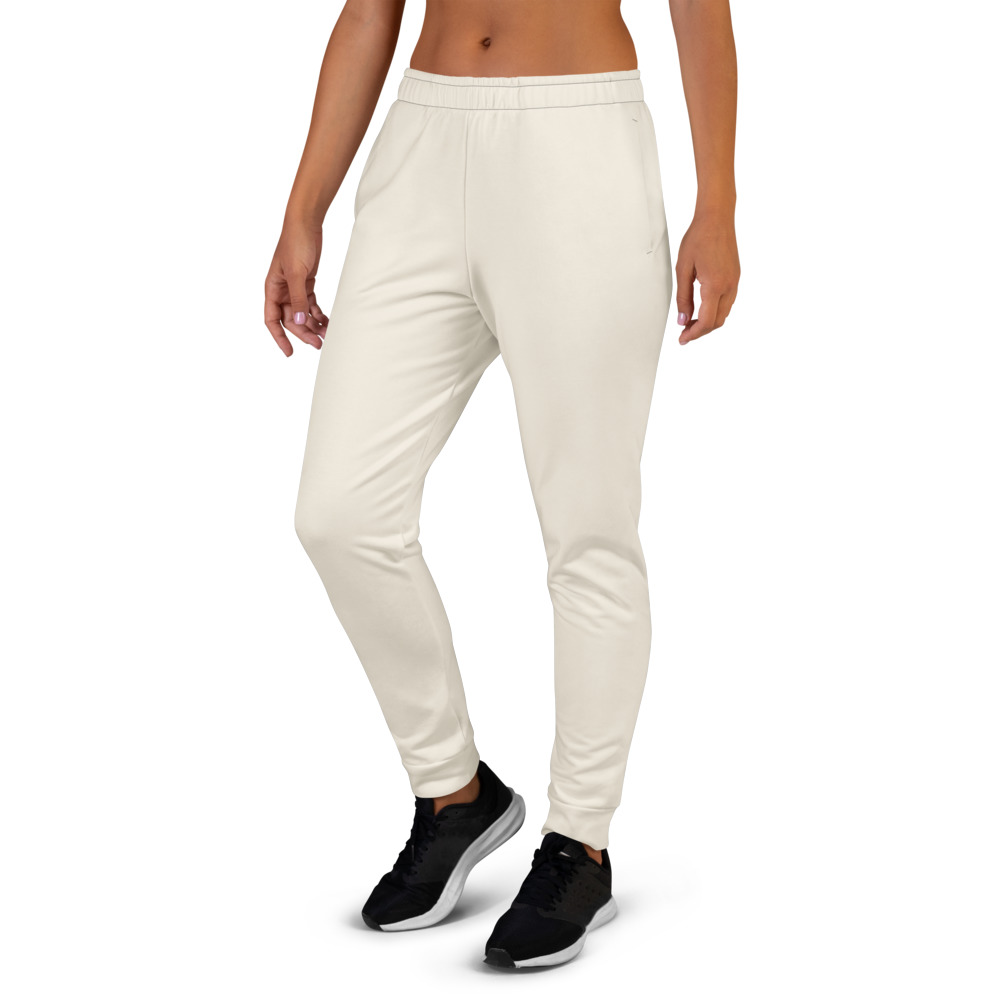 Arnwolf · Joggers reciclados para mujer con estampado completo — Marfil