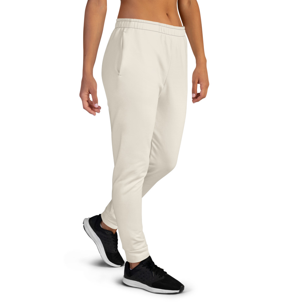 Arnwolf · Joggers reciclados para mujer con estampado completo — Marfil